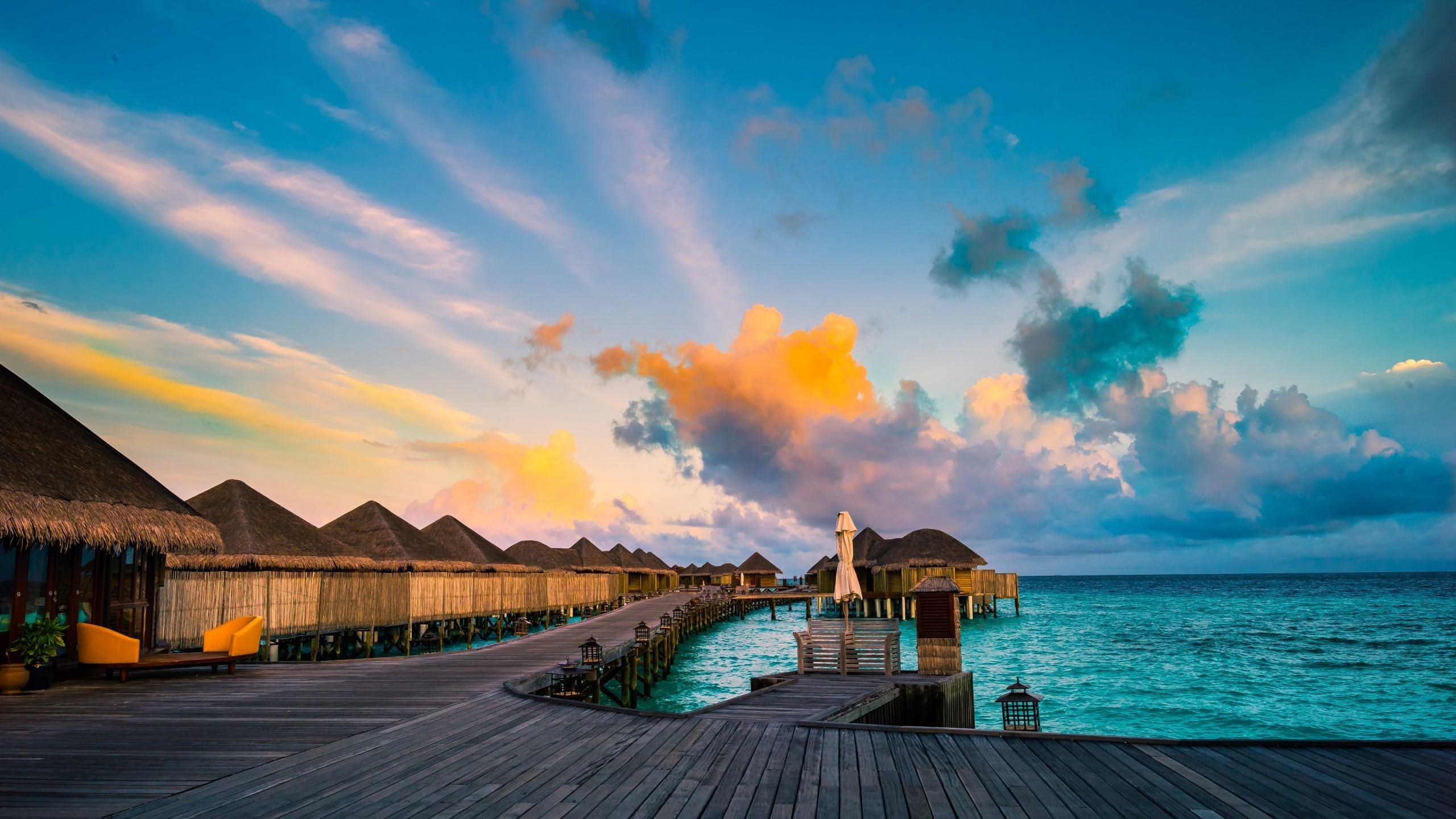 Overwater resort at sunset
